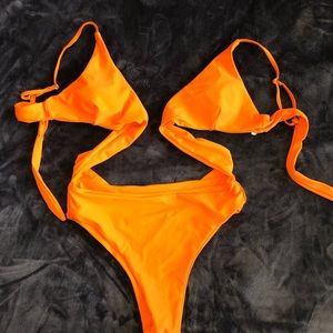 Cross body neon orange bathing suit